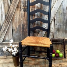 Black distressed ladder back chair