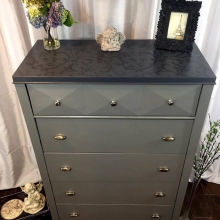 Custom dresser with tone on tone stencil