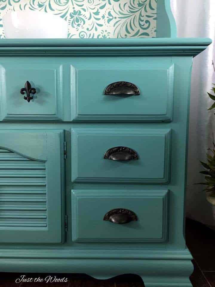 Painted sea foam china cabinet with stencil backing by Just the Woods