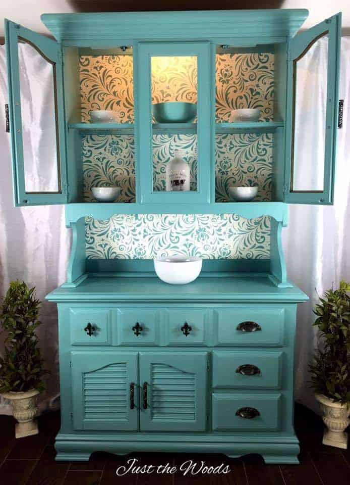 Painted sea foam china cabinet with stencil backing by Just the Woods