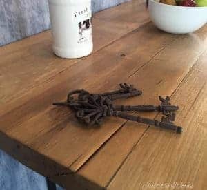 band wood table, farm table, metal keys