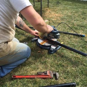 cutting steel pipe, hand made, reclaimed barn wood farm table, just the woods, barn wood, farmhouse, industrial, furniture, nyc, staten island, nj