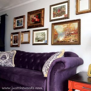 gallery-wall-over-purple-sofa, gallery wall, ornate frames