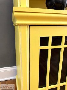 white-glaze-on-yellow-furniture, white detail, yellow and white paint, painted media console