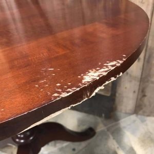 dog-bites-on-table, chewed wood, dog ate furniture, ethan allen table