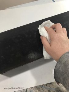 How to Paint an Old Metal Mailbox by Just the Woods clean-with-damp-cloth