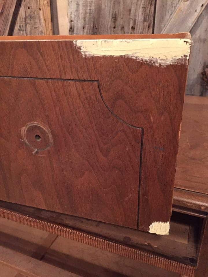 Filling in damage on drawers.