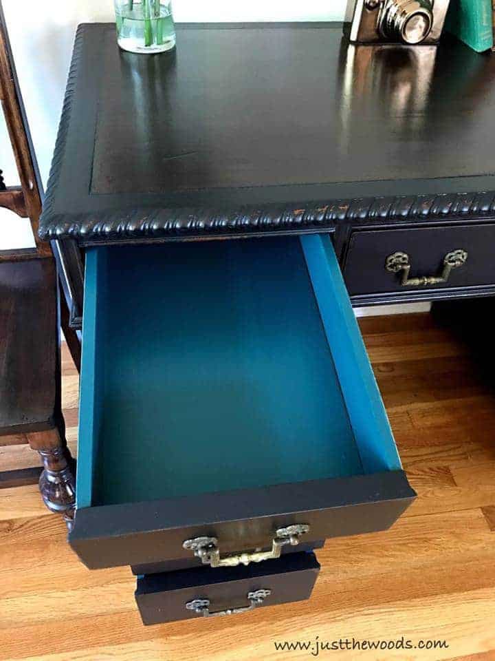 How to Save the Leather Top on a Vintage Desk / vintage desk with leather top painted black with teal inside drawers 