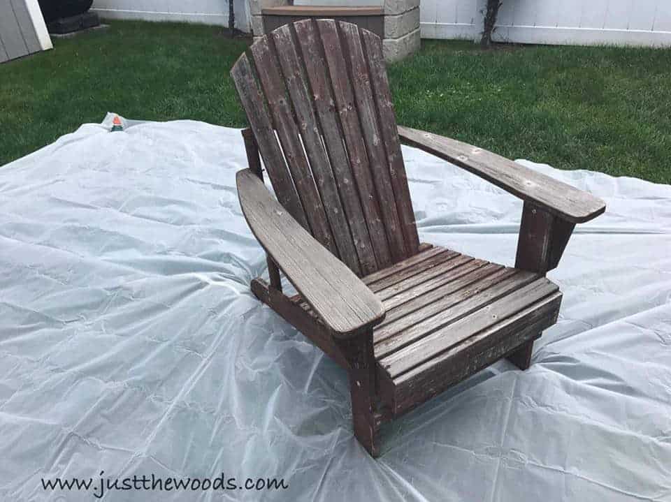 worn and weathered adirondack chair