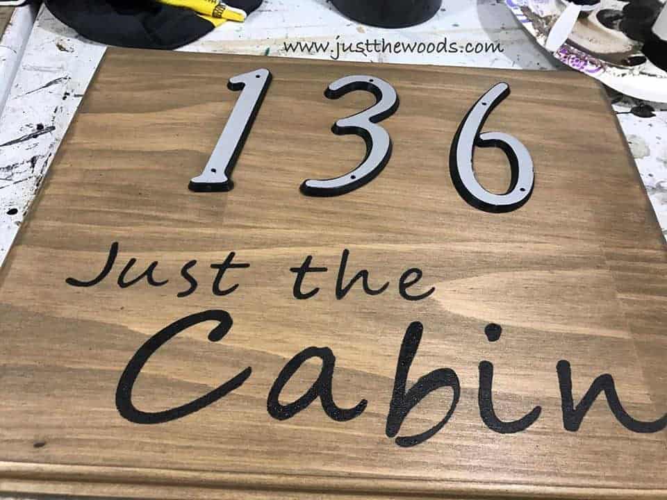 See how to make a custom address sign with scrap wood, a DIY stencil, and stain. Use pre-made house numbers or stencil them yourself with this easy DIY project and Cricut. Rustic address plaque, home sign, number sign, house number sign. 