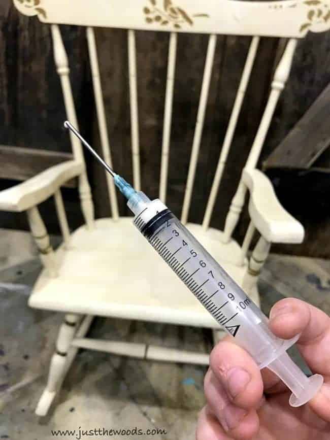 wood glue, syringe, vintage rocking chair