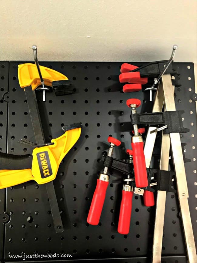 trigger clamps, woodworking clamps, pegboard tool organization ideas, pegboard tool organizer, organizing tools, pegboard wall, Tool pegboard, pegboard tool holder, pegboard tool storage, tool pegboard ideas, pegboard storage, tool hanging board, pegboards, peg board organizer