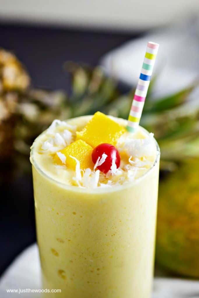 pineapple mango smoothie with cherry on top