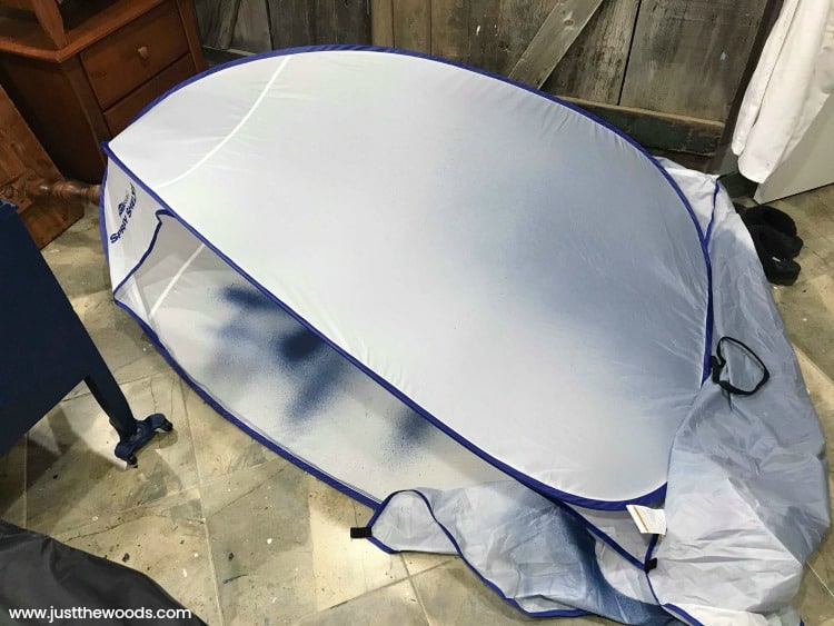 fold spray tent in half, clean up spray booth