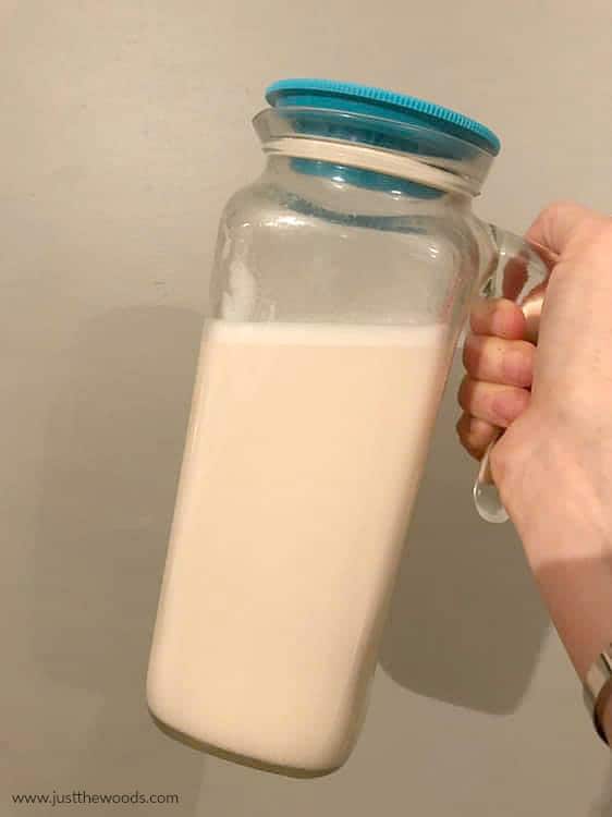 almond milk in glass container