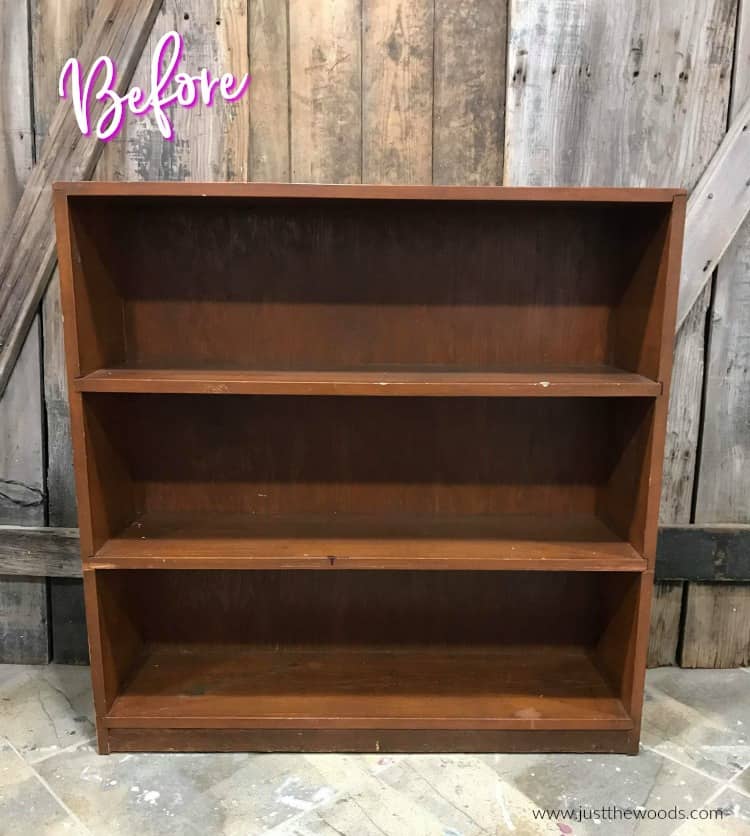 wooden bookcase, painting a bookcase, how to add paper on the back of a bookcase, decoupage on wood bookcase