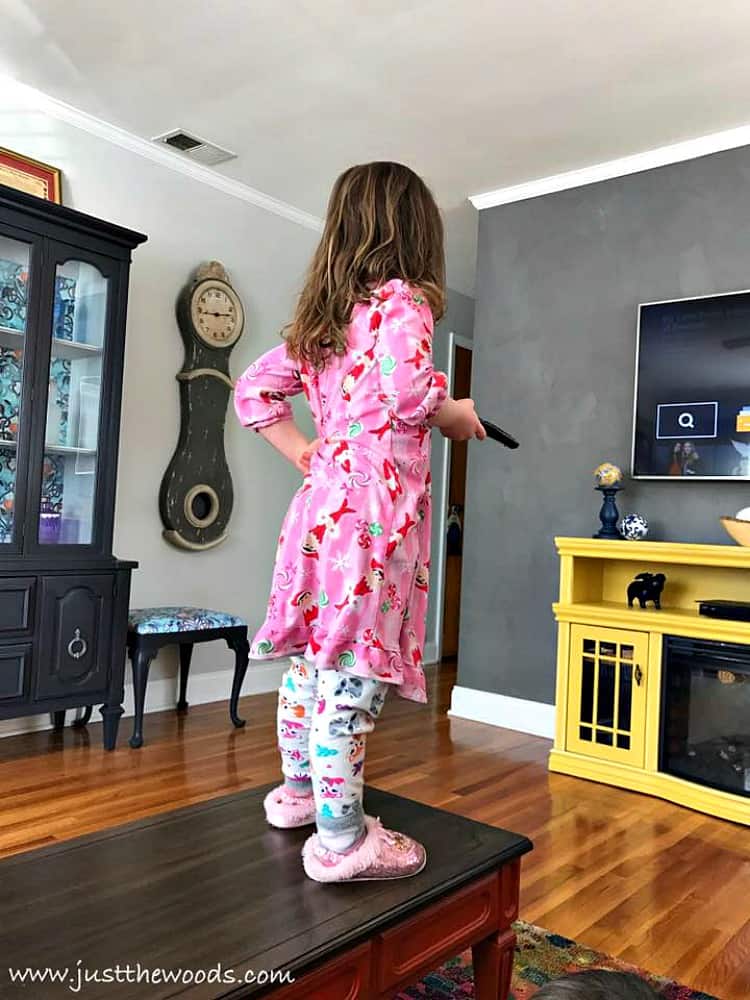 girl standing on table, standing on painted furniture, repaint furniture, paint over stain