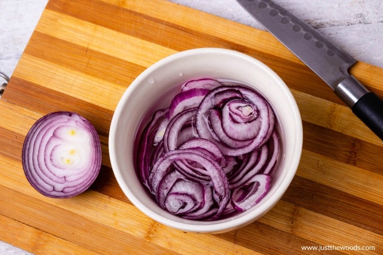 sliced red onions, onions in water, onions for salad