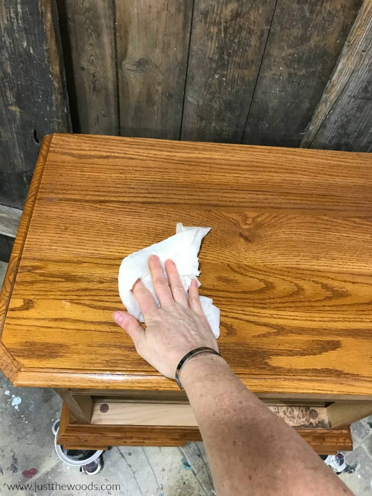 wipe wood furniture clean with damp cloth, remove dirt and dust from furniture