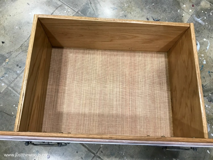 wooden drawer with wallpaper liner