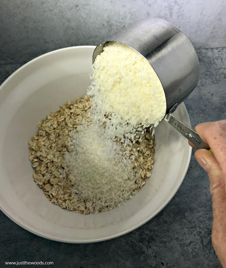 shredded coconut and rolled oats, making chocolate oat bars