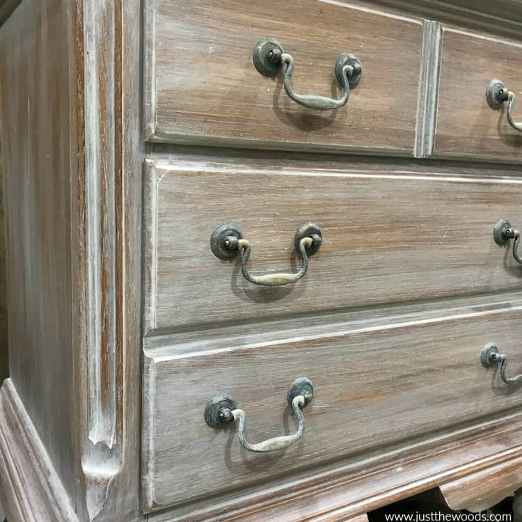 weathered wood dresser close up with whitewash hardware