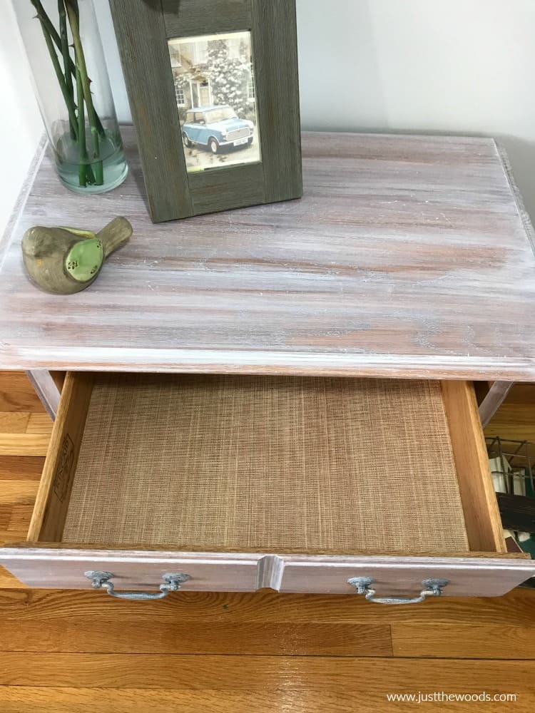 white wash furniture with lined drawers, wallpaper liner in drawer