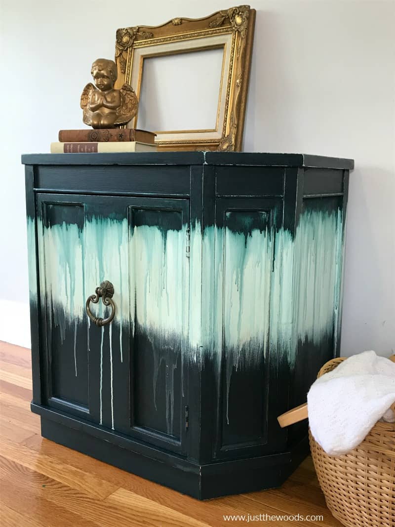 side view of chalk painted furniture with drippy paint look