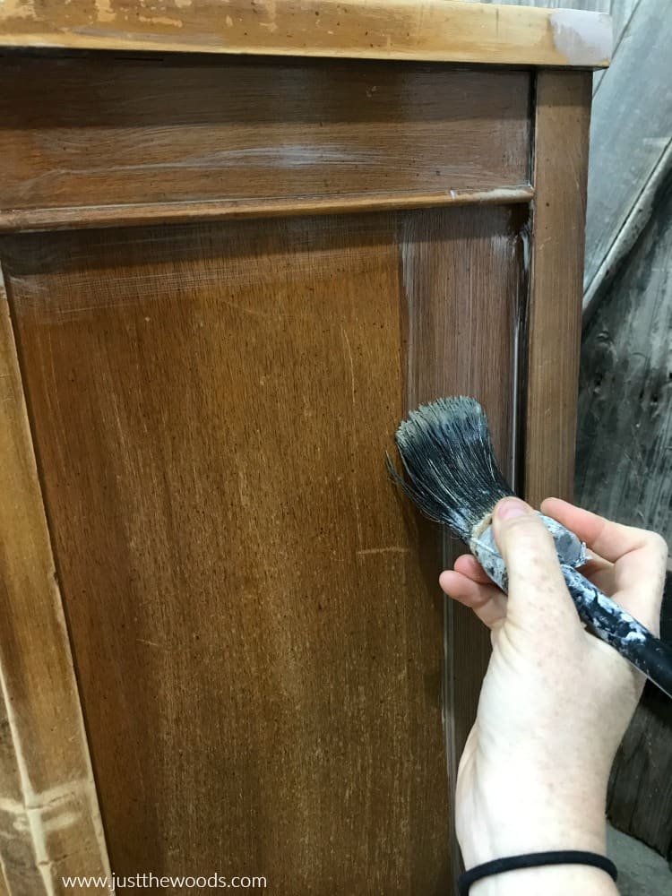 apply clear primer to wood furniture, cling on brush