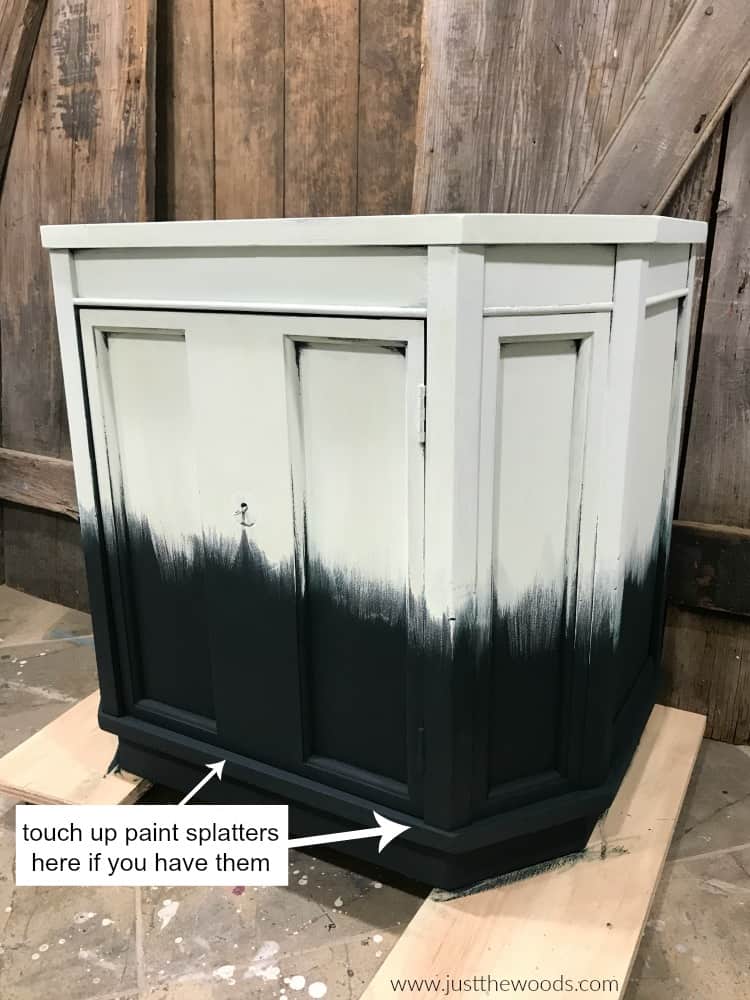 light green paint on top with dark green chalk paint on bottom of wood cabinet