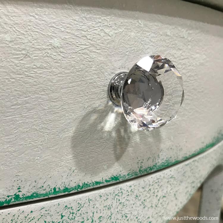 clear crystal hardware on painted furniture