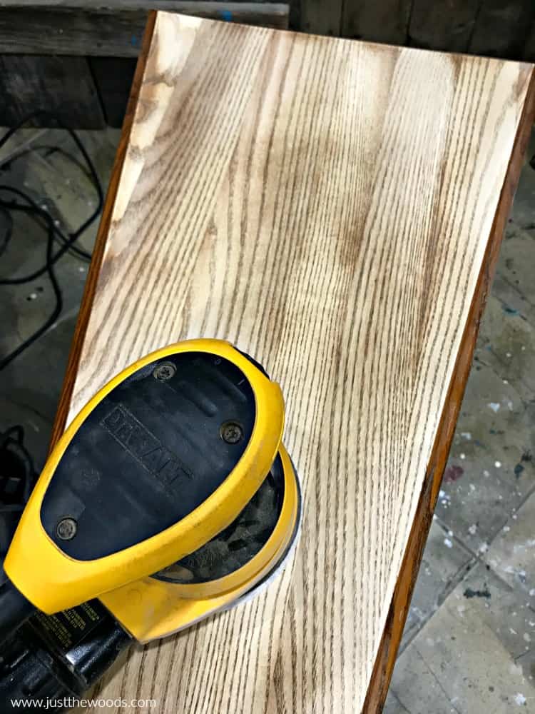 sanding wood furniture, how to stain wood, orbital sander on wood table