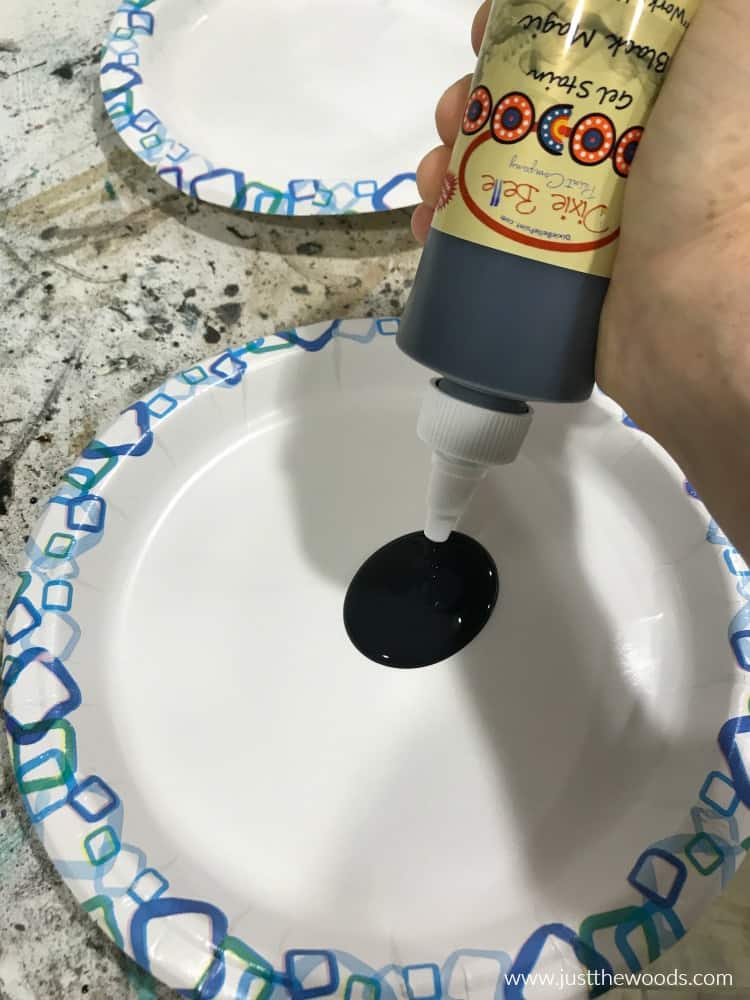 how to apply wood stain, black stain on paper plate