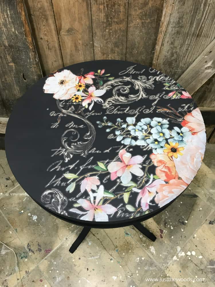 floral image on dark painted table