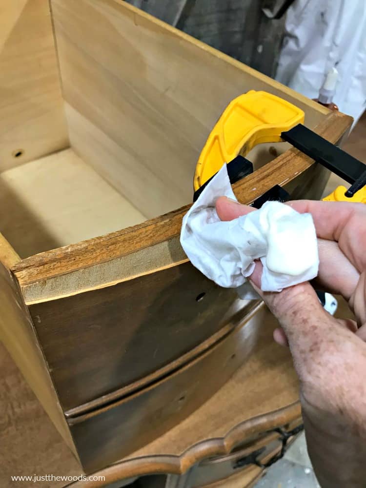 wipe glue with damp cloth, clamping and repairing damaged veneer