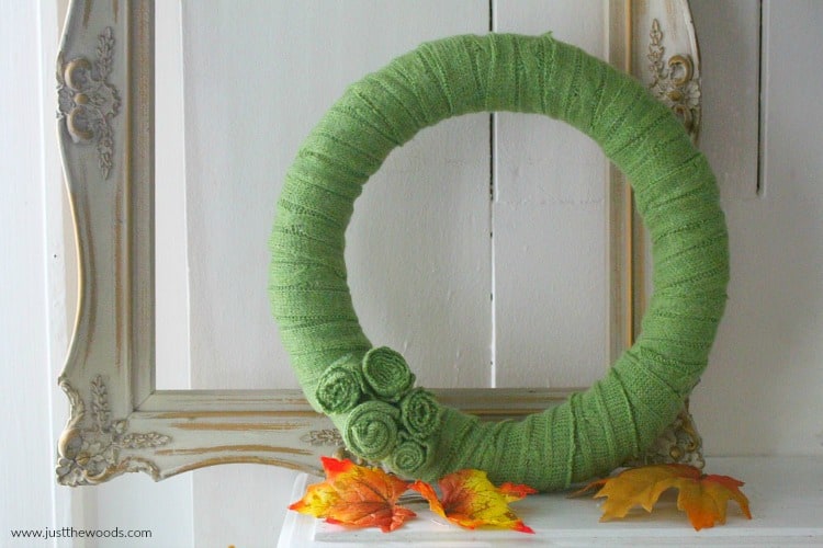 upcycled sweater craft, DIY wreath made with an old green sweater