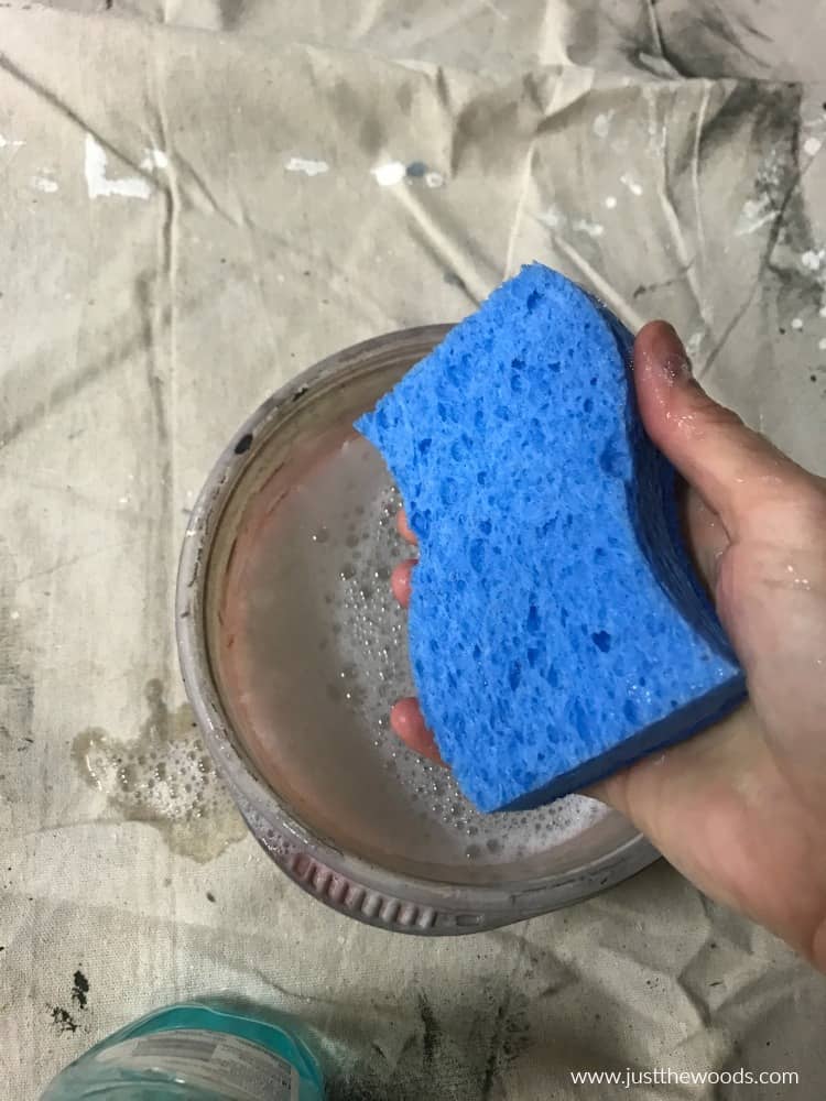 blue sponge in soapy water