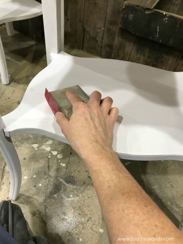 How to Distress Furniture for that Worn White Painted Look