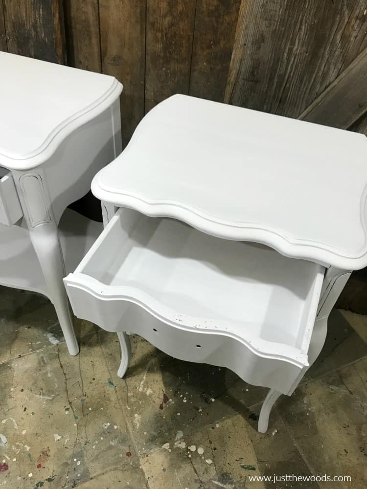 white painted tables with painted drawers