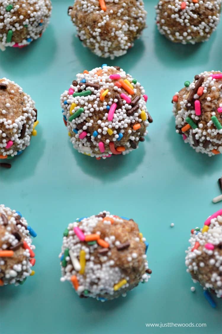 close up birthday cake cookie dough balls on blue background