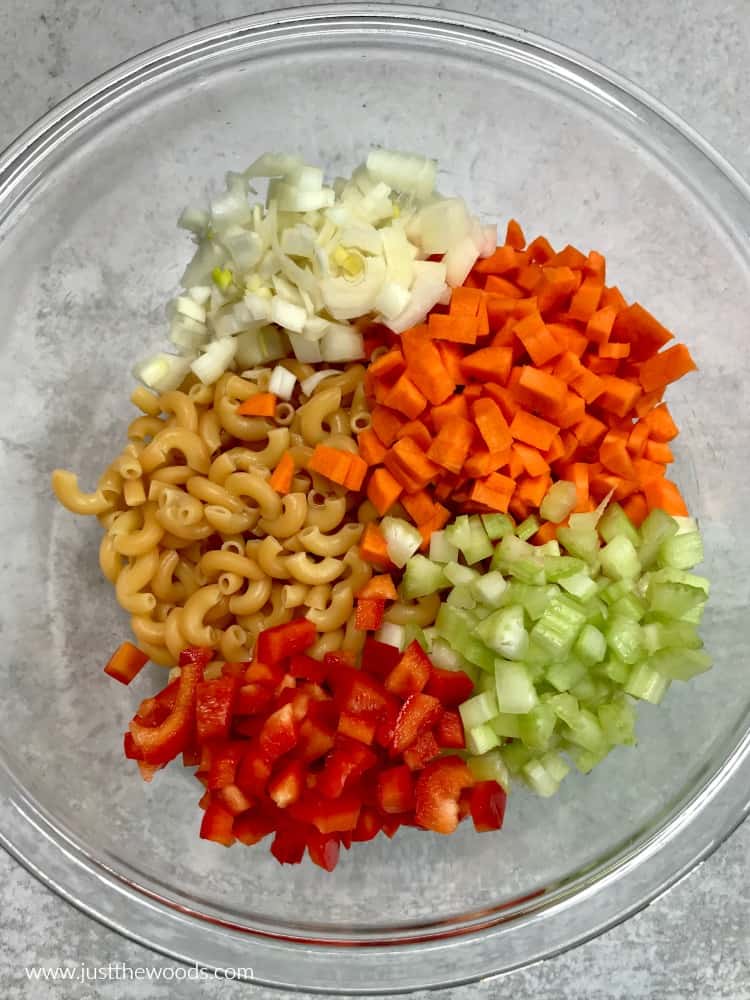 how to make simple macaroni salad, macaroni salad ingredients in glass bowl