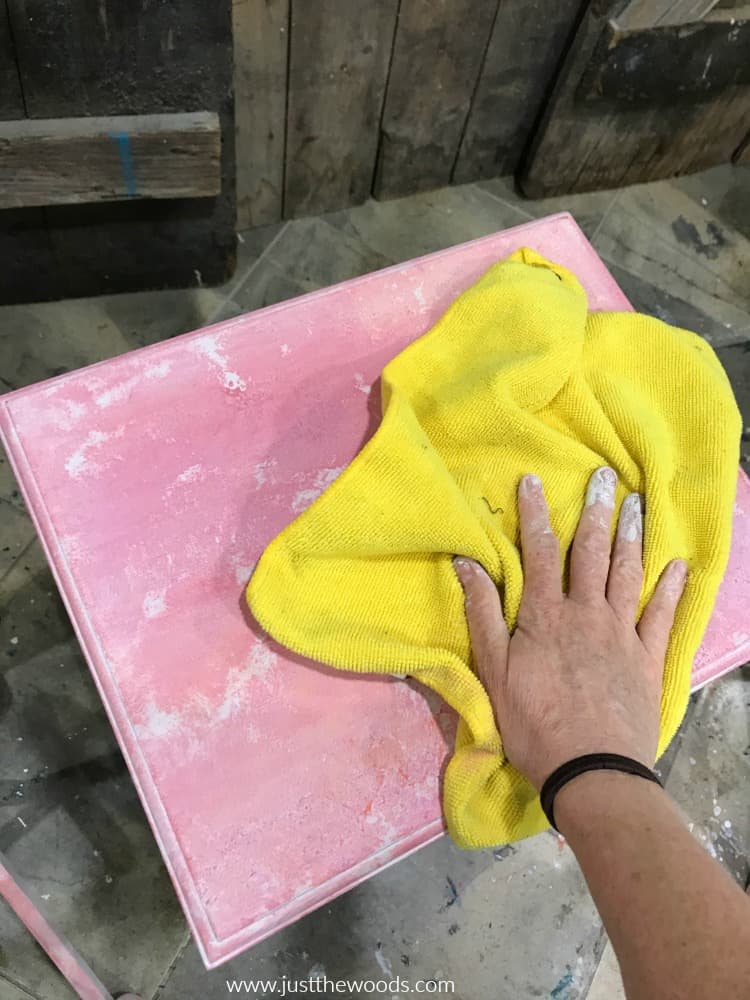 wipe tabletop with yellow lint free cloth