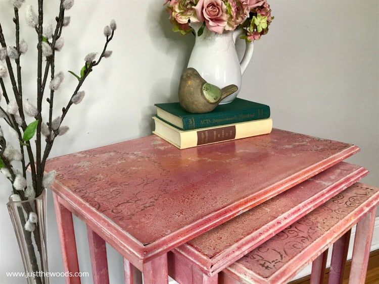 pink furniture painted with texture and bronze metallic stencil. close up table top