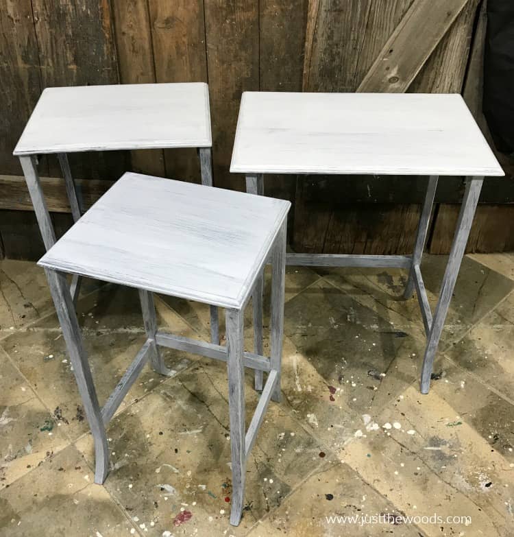 set of nesting end tables with gay primer