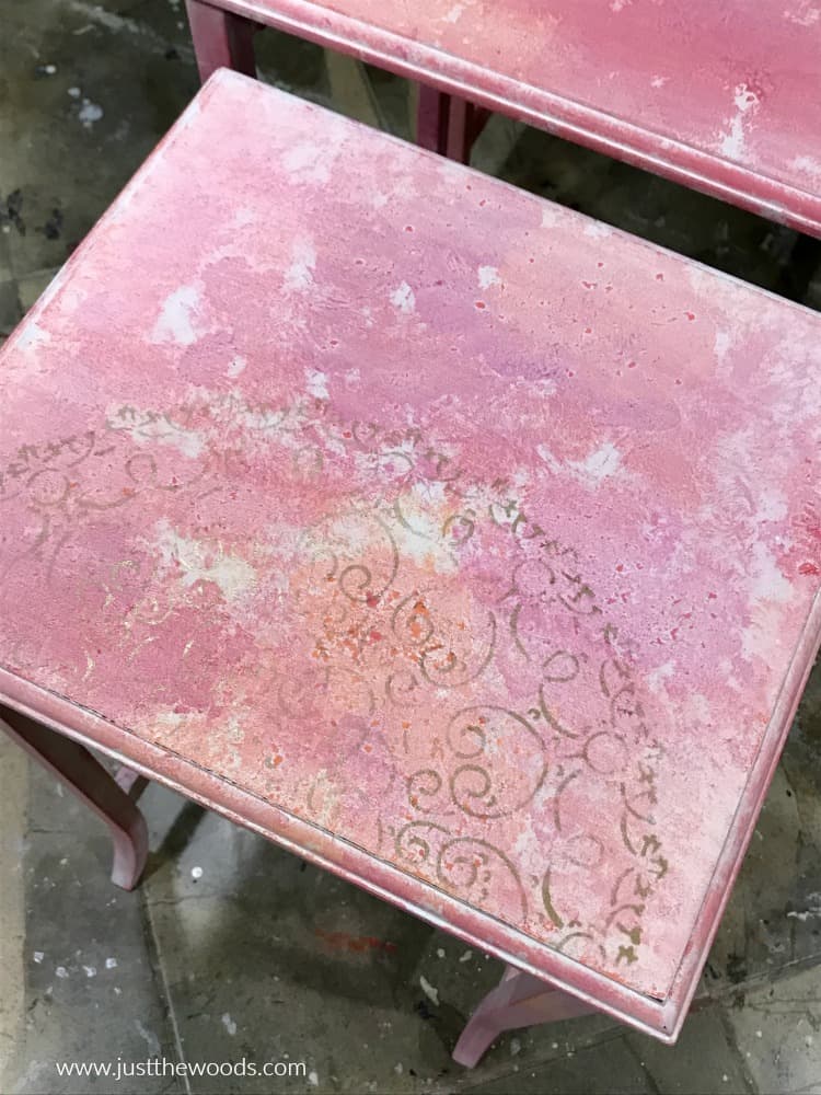 bronze metallic stencil design on pink painted furniture 