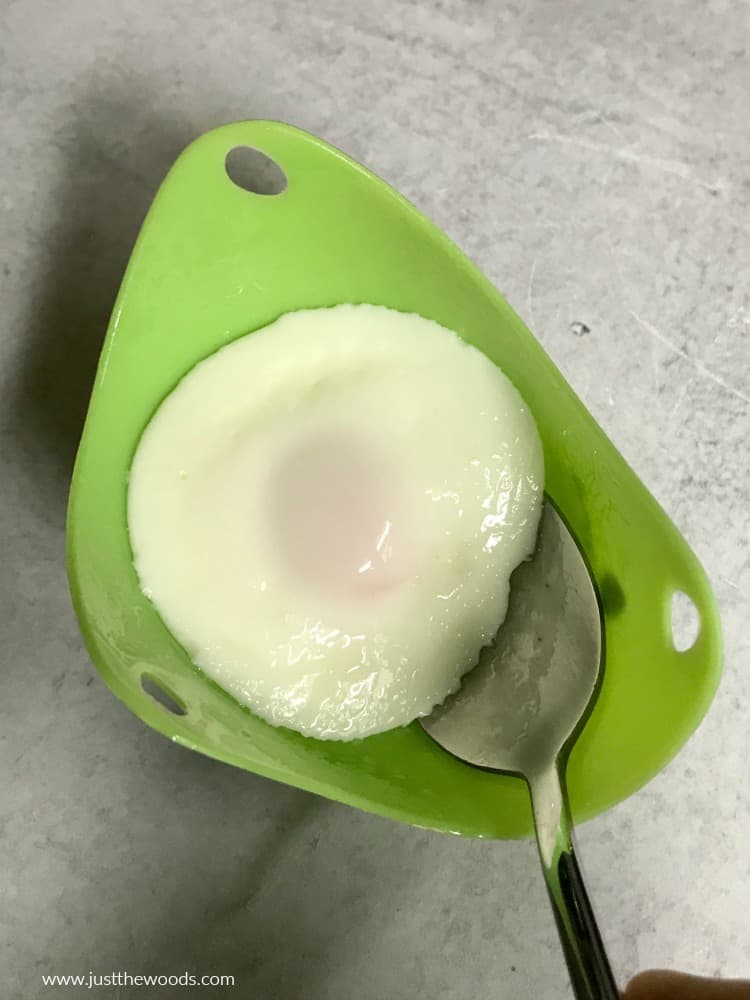 poached egg in egg poacher cups