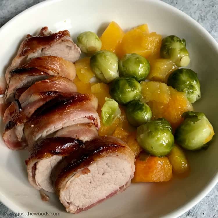 bacon wrapped pork with vegetables