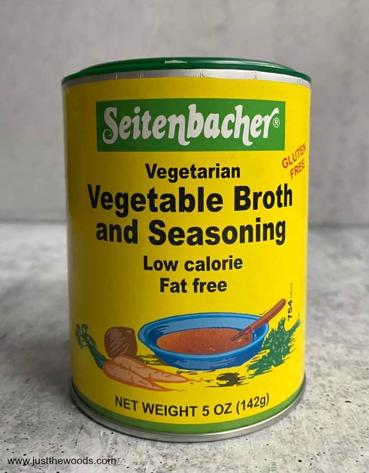 vegetable broth and seasoning in yellow container