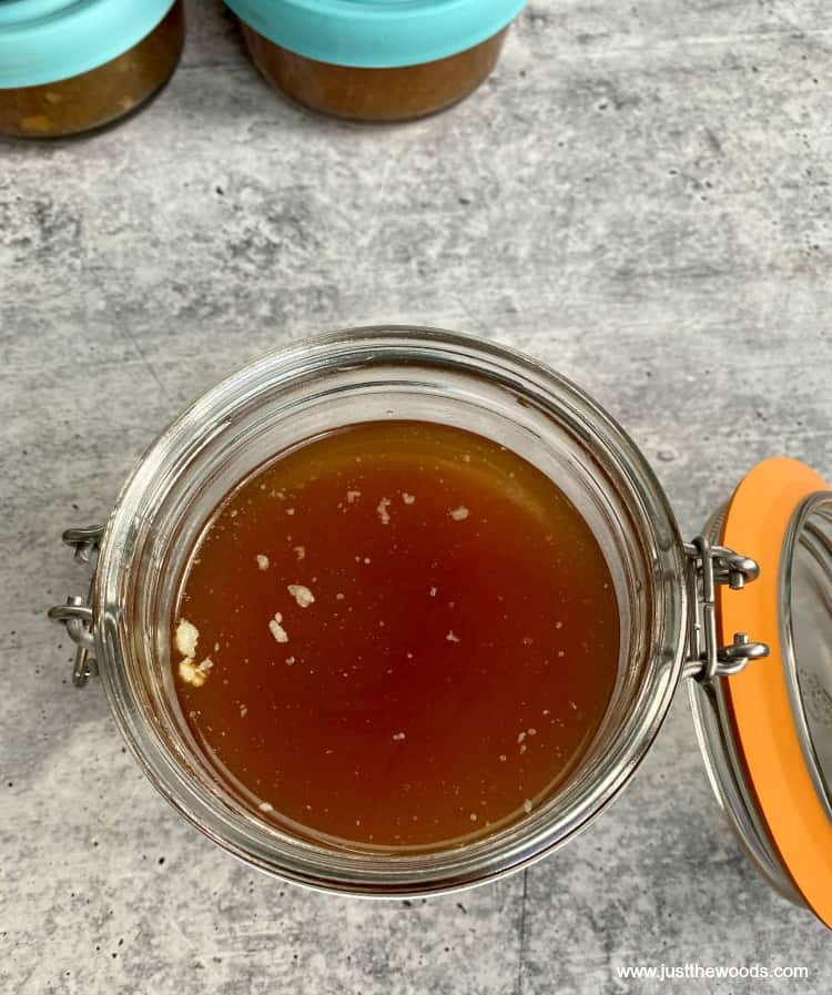 beef bone broth in glass container