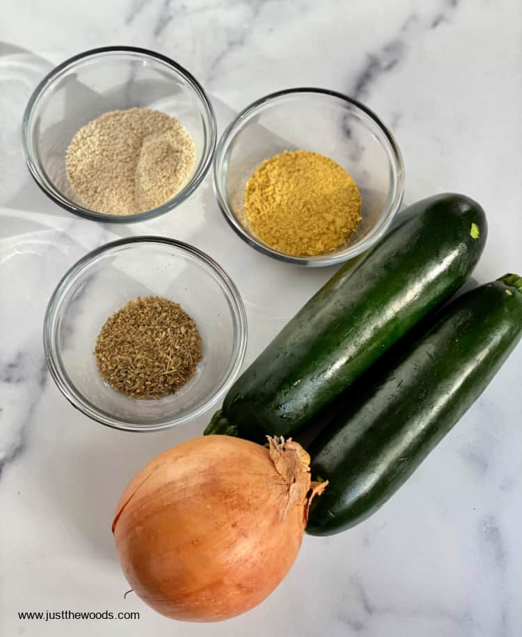 ingredients for how to make zucchini casserole with nutritional yeast and onion